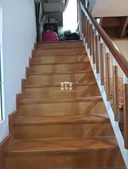 Well-maintained wooden staircase in modern home