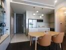 Modern kitchen with dining area and stylish lighting