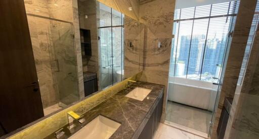 Luxurious bathroom with marble finishes and modern fixtures