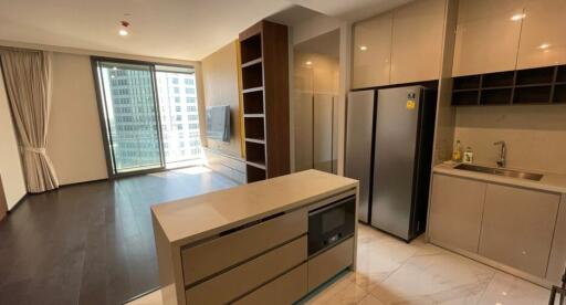 Modern kitchen with integrated living space in an apartment