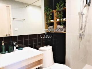 Modern bathroom interior with decorative plants and sleek design