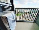 High-rise apartment balcony with panoramic city view