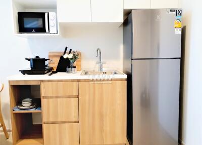 Modern compact kitchen with appliances