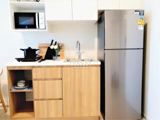 Modern compact kitchen with appliances