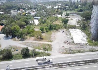 Aerial view of a property location near a highway