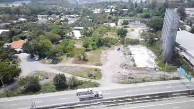Aerial view of a property location near a highway