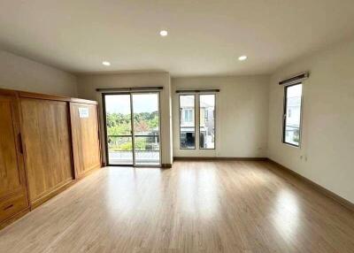 Spacious bedroom with natural lighting