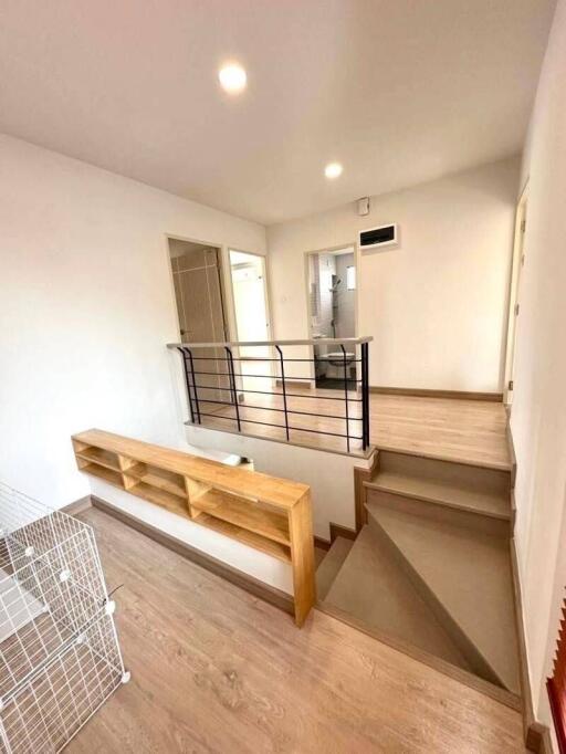 Modern staircase with wooden elements in a contemporary home