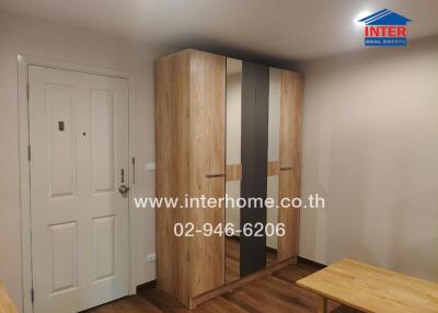 Modern bedroom with wooden wardrobe and sleek design