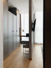 Modern bedroom with spacious wardrobe and study area