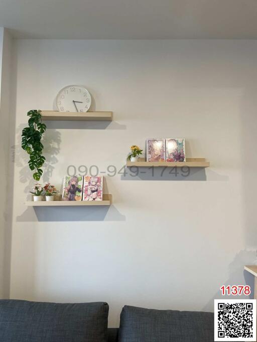 Bright and stylish living room wall with decorative shelves