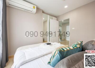 Spacious and modern bedroom with air conditioning