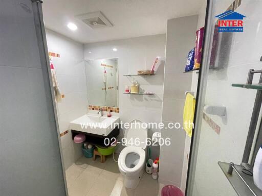 Clean and compact bathroom with modern amenities