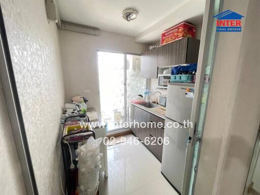 Compact and functional kitchen space with natural light