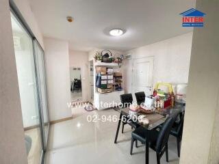 Modern kitchen with dining area and well-organized shelves