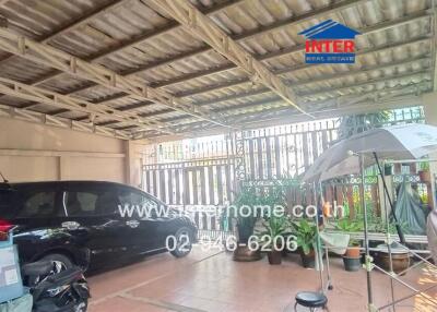 Spacious enclosed garage with parking and storage space