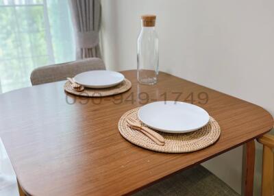 Well-arranged dining table in a modernly furnished room