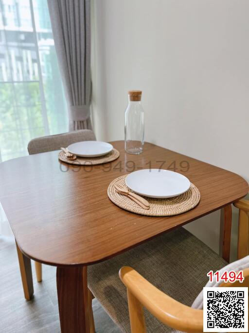Well-arranged dining table in a modernly furnished room