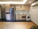 Modern compact kitchen with integrated appliances