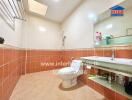 Spacious bathroom with modern fixtures and elegant tiling