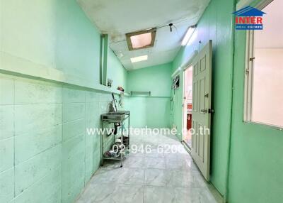 Bright and colorful hallway with tiled flooring