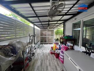 Spacious covered patio area with natural lighting