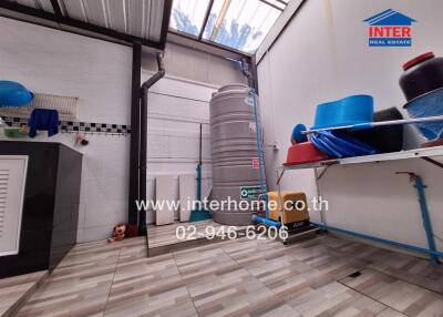 Spacious utility room with ample storage and modern facilities