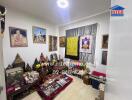 Decorated living room with religious and cultural artifacts