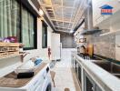 Modern kitchen in urban apartment with sleek appliances and space-efficient design