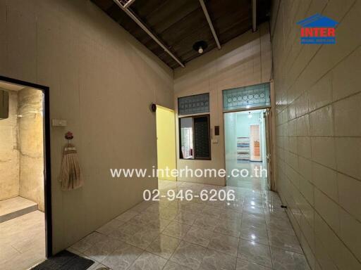 Interior view of a house showing hallway leading to rooms