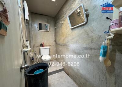 Compact bathroom with basic amenities