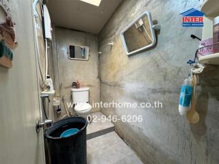 Compact bathroom with basic amenities