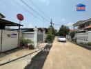 Residential street view with houses and parked car