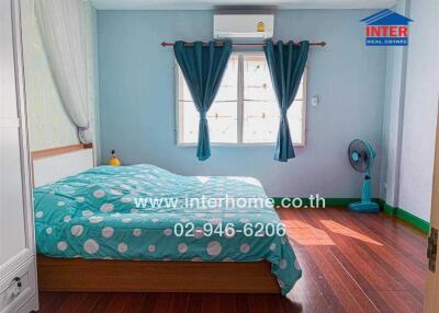 Bright and cozy bedroom with air conditioning