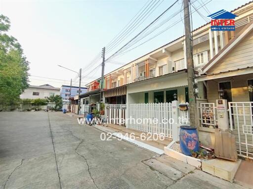 Street view of a residential townhouse complex