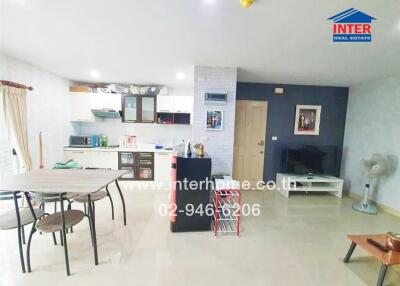 Spacious combined living room and kitchen with modern amenities and stylish interior