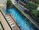 Aerial view of a modern outdoor swimming pool