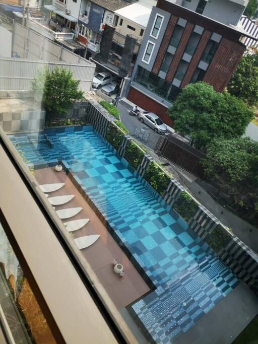 Aerial view of a modern outdoor swimming pool