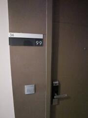 Apartment entry door with number 36 and lock system