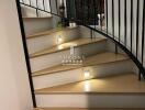 Modern staircase with LED lights and chic black handrails