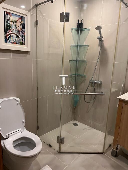 Modern bathroom with glass shower and toilet