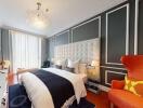 Elegant bedroom with modern decor and bright color accents