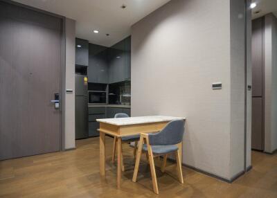 Modern kitchen with dining area and sleek design