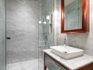 Modern bathroom with marble walls and stylish basin