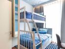 Compact modern bedroom with bunk beds, bright decor, and elegant furnishings