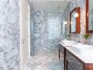 Luxurious marble tiled bathroom with modern fixtures