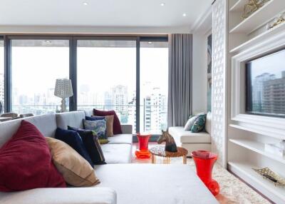 Elegant living room with modern furniture and city view