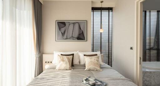 Elegant bedroom with natural light and modern decor