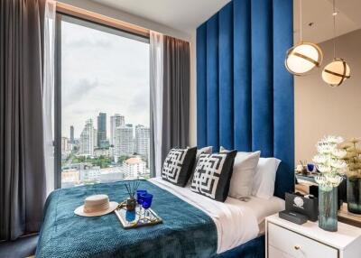Elegant bedroom with city view