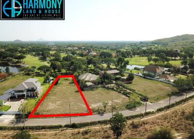 Aerial view of residential land plot available for sale in a lush green subdivision